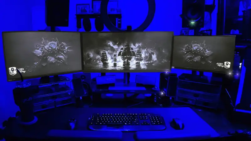 Brian Lee Westfall's triple-monitor design workstation in the Fort Worth studio