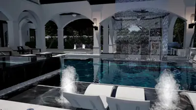 White arched loggia at night with a rain curtain pouring into a black-bottom pool, lounge chairs on the shelf
