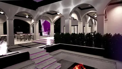 Sunken fire pit at night with glowing steps, the arched loggia behind