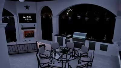 Outdoor dining under the arcade with the pool and lit fire bowls beyond